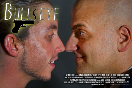 Two men confront each other nose-to-nose in a color promotional portrait.